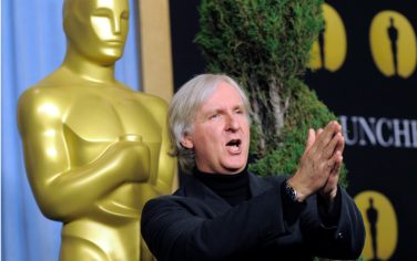 James Cameron, an Academy Award nominee for Best Director for "Avatar," gestures for photographers at the Academy Awards Nominees Luncheon in Beverly Hills, Calif., Monday, Feb. 15, 2010. (AP Photo/Chris Pizzello)
