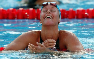 ROME - JULY 29:  Federica Pellegrini of Italy celebrates after breaking the world record setting a new time of 1:52.98 seconds in the Women's 200m Freestyle Final during the 13th FINA World Championships at the Stadio del Nuoto on July 29, 2009 in Rome, Italy.  (Photo by Clive Rose/Getty Images)