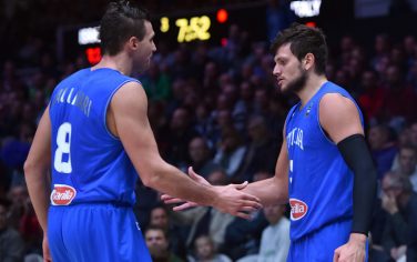 Italy's small forward Danilo Gallinari (L) and Italy's small forward Alessandro Gentile greet while substituting during the round of 16 basketball match between Israel and Italy at the EuroBasket 2015 in Lille, northern France, on September 13, 2015.  AFP PHOTO / PHILIPPE HUGUEN        (Photo credit should read PHILIPPE HUGUEN/AFP/Getty Images)
