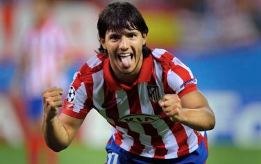 Atletico Madrid's Sergio 'Kun' Aguero from Argentina celebrates after scoring a goal during a second leg play-off soccer match of the UEFA Champions League against Panathinakos at the Vicente Calderon stadium on Tuesday, Aug. 25, 2009. (AP Photo/Daniel Ochoa de Olza)