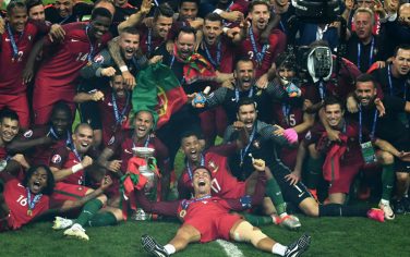 PARIS, FRANCE - JULY 10:  Cristiano Ronaldo (C) and Portugal players celebrate after their 1-0 win against France in the UEFA EURO 2016 Final match between Portugal and France at Stade de France on July 10, 2016 in Paris, France.  (Photo by Dan Mullan/Getty Images)