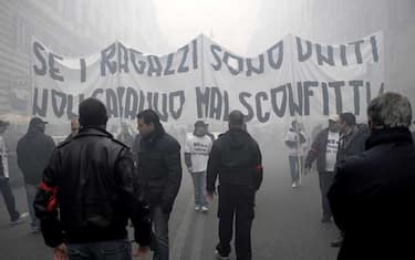 striscione_corteo_roma_contro_tessera_tifoso