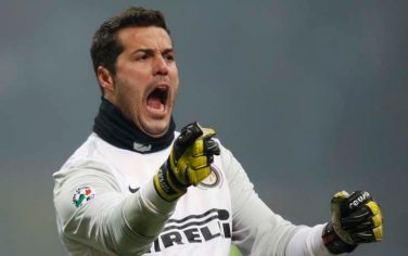 Inter Milan Brazilian goalkeeper Julio Cesar celebrates after his teammate Argentine forward Diego Milito, not pictured, scored during their Serie A soccer match between Inter Milan and AC Milan, at the San Siro stadium in Milan, Italy, Sunday, Jan. 24, 2010. (AP Photo/Luca Bruno)