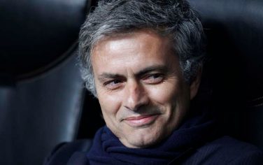 Inter Milan coach Jose' Mourinho, of Portugal, smiles during a Champions League quarterfinal, first leg soccer match between Inter Milan and CSKA Moscow at the San Siro stadium in Milan, Italy, Wednesday, March 31, 2010. (AP Photo/Luca Bruno)