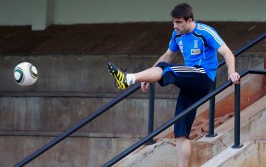 Defender Sokratis Papastathopoulos of Greece, kicks a ball as he arrives for the training session at the Northwood School, in northern Durban, South Africa, Monday, June 14, 2010. Greece will face Nigeria on Wednesday for their World Cup soccer tournament in Group B. (AP Photo/Thanassis Stavrakis)