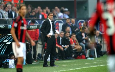 A.C. Milan's coach Massimiliano Allegri looks on during the Series A football match against Genoa at Meazza stadium in Milan on September 25, 2010. AC Milan won 1-0.   AFP PHOTO / VINCENZO PINTO (Photo credit should read VINCENZO PINTO/AFP/Getty Images)