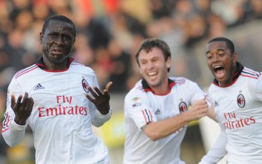 AC Milan's midfielder of Sierra Leone Rodney Strasser (L) celebrates after scoring a goal against Cagliari during their Italian Serie A football match on January 6, 2011 at St.Elia stadium in Cagliari. AFP PHOTO / Tiziana Fabi (Photo credit should read TIZIANA FABI/AFP/Getty Images)