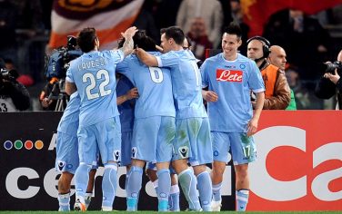 AS Roma's forward Edison Cavani celebrates with his team mates after scoring the 0-1 during the Serie A soccer match between Roma and Napoli in Rome's Olympic stadium, Italy, 12 February 2011.   ANSA/ETTORE FERRARI