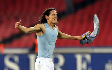 NAPLES, ITALY - DECEMBER 19: Edinson Cavani of SSC Napoli celebrates the victory after during the Serie A match between Napoli and Lecce at Stadio San Paolo on December 19, 2010 in Naples, Italy.  (Photo by Gabriele Maltinti/Getty Images) *** Local Caption *** Edinson Cavani