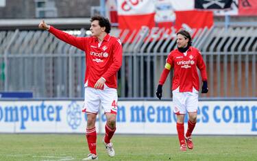 PIACENZA, ITALY - JANUARY 29:  Alessandro Marchi  (L) of Piacenza FC celebrates scoring the first goal during the Serie B match between Piacenza FC and Reggina Calcio at Stadio Leonardo Garilli on January 29, 2011 in Piacenza, Italy.  (Photo by Claudio Villa/Getty Images) *** Local Caption *** Alessandro Marchi