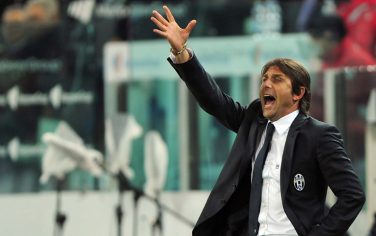 Juventus' coach Antonio Conte gestures during the Serie A football match between Juventus and Fiorentina at the "Juventus Stadium" in Turin on October 25, 2011. AFP PHOTO / GIUSEPPE CACACE (Photo credit should read GIUSEPPE CACACE/AFP/Getty Images)