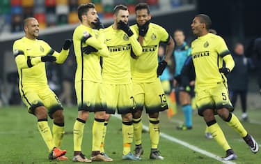 Inter's midfielder Marcelo Brozovic jubilates with teammates after scoring the 0-4 goal during the Italian Serie A soccer match between Udinese Calcio and FC Inter at Friuli Stadium in Udine, 12 December 2015. ANSA/ ALBERTO LANCIA