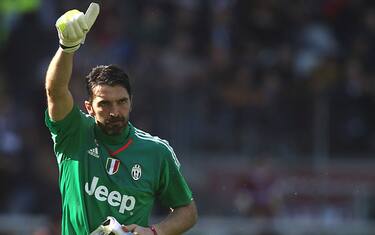 Juventus' goalkeeper Gianluigi Buffon gestures during the Italian Serie A football match Torino Vs Juventus on March 20, 2016 at the "Olympic Stadium" in Turin.  / AFP / MARCO BERTORELLO        (Photo credit should read MARCO BERTORELLO/AFP/Getty Images)