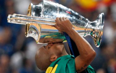 Inter Milan defender Maicon kisses the trophy after winning the Champions League final soccer match between Bayern Munich and Inter Milan at the Santiago Bernabeu stadium in Madrid, Saturday May 22, 2010. (AP Photo/Andres Kudacki)