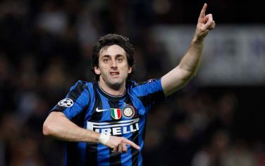 Inter Milan Argentine forward Diego Milito celebrates after scoring during a Champions League quarterfinal, first leg soccer match between Inter Milan and CSKA Moscow at the San Siro stadium in Milan, Italy, Wednesday, March 31, 2010. (AP Photo/Luca Bruno)