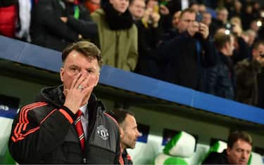 Manchester United's Dutch manager Louis van Gaal is pictured during the UEFA Champions League Group B second-leg football match VfL Wolfsburg vs Manchester United in Wolfsburg, central Germany, on December 8, 2015. AFP PHOTO / JOHN MACDOUGALL / AFP / JOHN MACDOUGALL        (Photo credit should read JOHN MACDOUGALL/AFP/Getty Images)