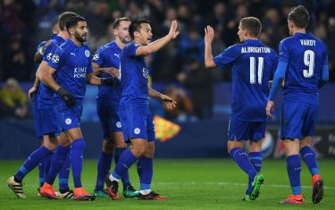 Leicester City's Algerian midfielder Riyad Mahrez (3L) celebrates scoring his team's second goal from the penalty spot with Leicester City's Japanese striker Shinji Okazaki (C) and Leicester City's English midfielder Marc Albrighton (2R) and Leicester City's English striker Jamie Vardy (R) during the UEFA Champions League group G football match between Leicester City and Club Brugge at the King Power Stadium in Leicester, central England on November 22, 2016. / AFP / Paul ELLIS        (Photo credit should read PAUL ELLIS/AFP/Getty Images)