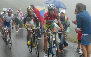 epa02331556 Overall leader of the Vuelta, Vincenzo Nibali (R) is followed by Peter Velits (HTC-Columbia) and Joaquin 'Purito' Rodriguez (Katyusha) (L), during the 15th stage of Spain's cycling Vuelta 2010 in Lagos de Covadonga (Cantabria) Northern Spain, 12 September 2010. Spanish Carlos Barredo (Quick Step) won this stage which covered a distance of 170 kilometres between Solares and Lagos de Covadonga. Italian Vincenzo Nibali (Liquigas) is the overall leader of the Vuelta after 15 stages.  EPA/ZIPI