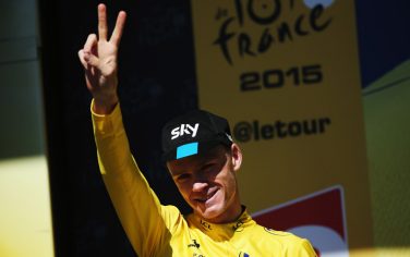 L'ALPE D'HUEZ, FRANCE - JULY 25:  Chris Froome of Great Britain and Team SKY celebrates after retaining his overall leaders yellow jersey after the twentieth stage of the 2015 Tour de France, a 110.5 km stage between Modane Valfrejus and L'Alpe d'Huez on July 25, 2015 in L'Alpe d'Huez, France.  (Photo by Doug Pensinger/Getty Images)