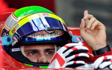epa02076059 Brazilian Formula One driver Felipe Massa of Scuderia Ferrari sits in his car before the first practice session at the Bahrain International Circuit in Sakhir, Bahrain, 12 March 2010. The Formula One Grand Prix of Bahrain will take place on Sunday 14 March 2010.  EPA/FRANCK ROBICHON