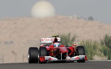 Ferrari driver Fernando Alonso of Spain steers his car during the second practice session at the Formula One Bahrain International Circuit in Sakhir, Bahrain, Friday, March 12, 2010. The Bahrain Formula One Grand Prix will take place here on Sunday. (AP Photo/Gero Breloer)