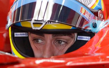 Ferrari Formula One driver Fernando Alonso of Spain waits in his car during the first practice session at the Australian Formula One Grand Prix in Melbourne,Friday, March 26, 2010. (AP Photo/Rob Griffith)