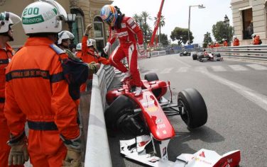 Ferrari driver Fernando Alonso of Spain leaves his car after crashing during the third free practice ahead of the Monaco Formula One Grand Prix at the Monaco racetrack, in Monaco, Saturday, May 15, 2010. The Formula Monaco Formula One Grand Prix will take place here on Sunday, May 16. (AP Photo/Claude Paris)