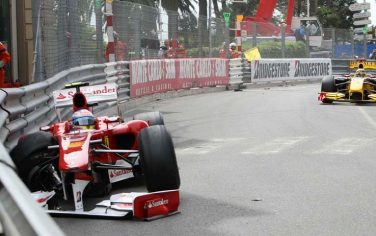 Ferrari driver Fernando Alonso of Spain crashes , left, as Renault driver Robert Kubica of Poland steers his car during the third free practice ahead of the Monaco Formula One Grand Prix at the Monaco racetrack, in Monaco, Saturday, May 15, 2010. The Formula Monaco Formula One Grand Prix will take place here on Sunday, May 16. (AP Photo/Claude Paris)