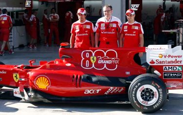From left, Ferrari driver Fernando Alonso of Spain, Ferrari team principal Stefano Domenicali of Italy and Ferrari driver Felipe Massa of Brazil pose at pit with a Ferrari car with a special commemorative logo of the Italian team?s 800th Grand Prix placed on the engines, ahead of the Turkish Formula One Grand Prix at the Istanbul Park circuit racetrack, in Istanbul, Turkey, Thursday, May 27, 2010. The Formula one race will be held on Sunday. (AP Photo/Luca Bruno)
