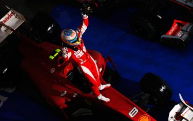 YEONGAM GUN, SOUTH KOREA - OCTOBER 24:  Fernando Alonso of Spain and Ferrari celebrates in parc ferme after winning the Korean Formula One Grand Prix at the Korea International Circuit on October 24, 2010 in Yeongam-gun, South Korea.  (Photo by Mark Thompson/Getty Images) *** Local Caption *** Fernando Alonso
