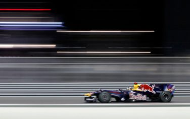 Red Bull's German driver Sebastian Vettel  drives at the Yas Marina circuit on November 12, 2010 in Abu Dhabi, during the second free practice session of the Abu Dhabi Formula One Grand Prix.            AFP PHOTO / GUILLAUME BAPTISTE (Photo credit should read GUILLAUME BAPTISTE/AFP/Getty Images)