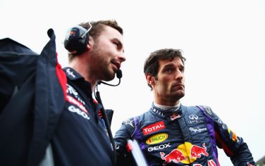 KUALA LUMPUR, MALAYSIA - MARCH 24:  Mark Webber of Australia and Infiniti Red Bull Racing talks with his race engineer Simon Rennie as he prepares to drive during the Malaysian Formula One Grand Prix at the Sepang Circuit on March 24, 2013 in Kuala Lumpur, Malaysia.  (Photo by Paul Gilham/Getty Images)