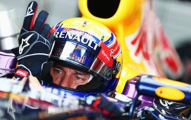 SUZUKA, JAPAN - OCTOBER 12:  Mark Webber of Australia and Infiniti Red Bull Racing prepares to drive during the final practice session prior to qualifying for the Japanese Formula One Grand Prix at Suzuka Circuit on October 12, 2013 in Suzuka, Japan.  (Photo by Clive Mason/Getty Images)