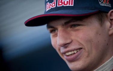 Toro Rosso's Dutch driver Max Verstappen smiles during the unveiling ceremony of the Toro Rosso STR10 racing car as part of the Formula One test days, at Jerez racetrack in Jerez on January 31, 2015.   AFP PHOTO/ JORGE GUERRERO        (Photo credit should read Jorge Guerrero/AFP/Getty Images)