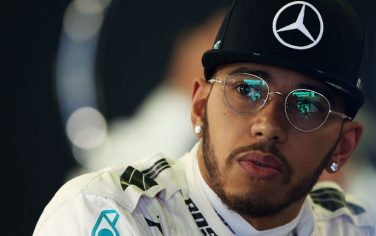 MELBOURNE, AUSTRALIA - MARCH 18: Lewis Hamilton of Great Britain and Mercedes GP in the garage during practice ahead of the Australian Formula One Grand Prix at Albert Park on March 18, 2016 in Melbourne, Australia.  (Photo by Lars Baron/Getty Images)