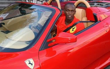 MONTE CARLO, MONACO - NOVEMBER 23:  Usain Bolt of Jamaica goes for a drive in a Ferrari in the streets of Monaco before the IAAF World Athletics Gala at the Hotel on November 23, 2008 in Monte Carlo, Monaco.  (Photo by Julian Finney/Getty Images)