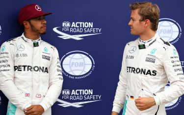 MONTREAL, QC - JUNE 11:  Lewis Hamilton of Great Britain and Mercedes GP and Nico Rosberg of Germany and Mercedes GP talk in parc ferme during qualifying for the Canadian Formula One Grand Prix at Circuit Gilles Villeneuve on June 11, 2016 in Montreal, Canada.  (Photo by Mark Thompson/Getty Images)