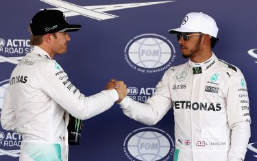 MEXICO CITY, MEXICO - OCTOBER 29:  Nico Rosberg of Germany and Mercedes GP congratulates Lewis Hamilton of Great Britain and Mercedes GP after Lewis qualified on pole during qualifying for the Formula One Grand Prix of Mexico at Autodromo Hermanos Rodriguez on October 29, 2016 in Mexico City, Mexico.  (Photo by Mark Thompson/Getty Images)