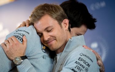 CORRECTION - Formula One World champion Germany's Nico Rosberg (L) hugs with his Mercedes Petronas boss Toto Wolff after he announced to end his F1 career during the FIA Prize Giving Gala at the Hofburg palace in Vienna, Austria on December 2, 2016. / AFP / JOE KLAMAR / The erroneous mention appearing in the metadata of this photo by JOE KLAMAR has been modified in AFP systems in the following manner: [Toto Wolff] instead of [Toto Wolf]. Please immediately remove the erroneous mention from all your online services and delete it  from your servers. If you have been authorized by AFP to distribute it to third parties, please ensure that the same actions are carried out by them. Failure to promptly comply with these instructions will entail liability on your part for any continued or post notification usage. Therefore we thank you very much for all your attention and prompt action. We are sorry for the inconvenience this notification may cause and remain at your disposal for any further information you may require.        (Photo credit should read JOE KLAMAR/AFP/Getty Images)