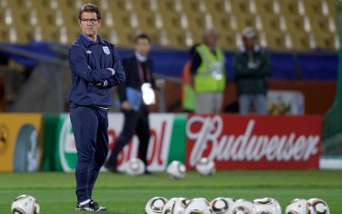 England soccer team manager Fabio Capello watches his team during a training session at The Royal Bafokeng Stadium in Rustenburg, South Africa, Friday, June 11, 2010. England play USA in a soccer World Cup Group C match on June 12 at the stadium. (AP Photo/Kirsty Wigglesworth)