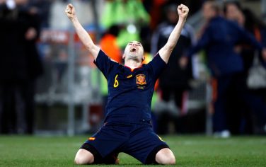 Spain's Andres Iniesta celebrates after scoring a goal during the World Cup final soccer match between the Netherlands and Spain at Soccer City in Johannesburg, South Africa, Sunday, July 11, 2010.  Spain won 1-0.  (AP Photo/Luca Bruno)