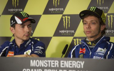 LE MANS, FRANCE - MAY 15:  Valentino Rossi of Italy and Movistar Yamaha MotoGP  Jorge Lorenzo (L) of Spain and Movistar Yamaha MotoGP look on  during the press conference during the MotoGp of France - Press Conference at  on May 15, 2014 in Le Mans, France.  (Photo by Mirco Lazzari gp/Getty Images)