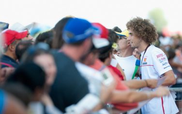 MISANO ADRIATICO, ITALY - SEPTEMBER 03:  Marco Simoncelli of Italy and San Carlo Honda Gresini poses for fans during the pit walk of MotoGP of San Marino in Misano World Circuit in Misano Adriatico on September 3, 2010 in Misano Adriatico, Italy.  (Photo by Mirco Lazzari gp/Getty Images) *** Local Caption *** Marco Simoncelli