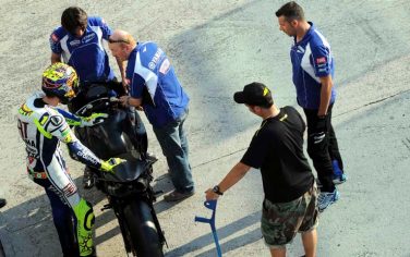 Nine-time MotoGP world champion Valentino Rossi prepares to test a Yamaha YZF-R1 at the Misano circuit, in Misano, Italy, Wednesday, July 7, 2010. Rossi has made a remarkable return to action just over a month since breaking his leg in a crash. The Italian rider tested a Yamaha YZF-R1 bike at a private testing session at the Misano circuit on Wednesday. Rossi broke his right leg on June 5 during practice for the Italian Grand Prix. Following the accident he underwent surgery for two-and-a-half hours to repair a displaced and exposed fracture of his right tibia. (AP Photo/Albano Venturelli)