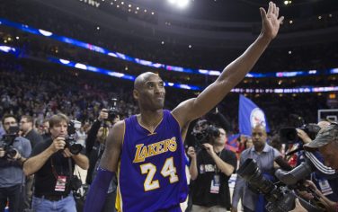 PHILADELPHIA, PA - DECEMBER 1: Kobe Bryant #24 of the Los Angeles Lakers waves to the crowd after the game against the Philadelphia 76ers on December 1, 2015 at the Wells Fargo Center in Philadelphia, Pennsylvania. NOTE TO USER: User expressly acknowledges and agrees that, by downloading and or using this photograph, User is consenting to the terms and conditions of the Getty Images License Agreement. The 76ers defeated the Lakers 103-91. (Photo by Mitchell Leff/Getty Images)