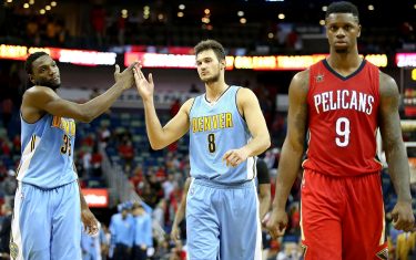 NEW ORLEANS, LA - OCTOBER 26:  Kenneth Faried #35 and Danilo Gallinari #8 of the Denver Nuggets react after defeating the New Orleans Pelicans at the Smoothie King Center on October 26, 2016 in New Orleans, Louisiana. Denver won the game 107-102. NOTE TO USER: User expressly acknowledges and agrees that, by downloading and or using this photograph, User is consenting to the terms of the Getty Images License Agreement. (Photo by Sean Gardner/Getty Images)
