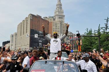 CLEVELAND, OH - JUNE 22:  LeBron James #23 of the Cleveland Cavaliers waves to the fans during the Cleveland Cavaliers Victory Parade And Rally on June 22, 2016 in downtown Cleveland, Ohio.  NOTE TO USER: User expressly acknowledges and agrees that, by downloading and/or using this Photograph, user is consenting to the terms and conditions of the Getty Images License Agreement. Mandatory Copyright Notice: Copyright 2016 NBAE  (Photo by David Liam Kyle/NBAE/Getty Images)