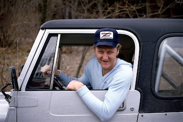 1985:  Larry Bird #33 of the Boston Celtics poses for a photo in his truck.     NOTE TO USER: User expressly acknowledges and agrees that, by downloading and/or using this Photograph, User is consenting to the terms and conditions of the Getty Images License Agreement.   Mandatory copyright notice and Credit:  Copyright 2001 NBAE  (Photo by Ken Regan/NBAE/Getty Images)