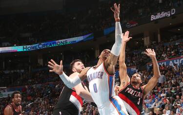 OKLAHOMA CITY, OK - MARCH 7: Russell Westbrook #0 of the Oklahoma City Thunder goes for a lay up against the Portland Trail Blazers during the game on March 7, 2017 at Chesapeake Energy Arena in Oklahoma City, Oklahoma. NOTE TO USER: User expressly acknowledges and agrees that, by downloading and or using this photograph, User is consenting to the terms and conditions of the Getty Images License Agreement. Mandatory Copyright Notice: Copyright 2017 NBAE (Photo by Layne Murdoch/NBAE via Getty Images)