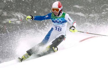 Nicole Gius of Italy speeds down the course during the first run of the Women's slalom, at the Vancouver 2010 Olympics in Whistler, British Columbia, Friday, Feb. 26, 2010. (AP Photo Alessandro Trovati)